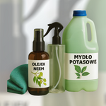 Naturalne środki do pielęgnacji roślin – butelka olejku neem, mydło potasowe i spryskiwacz z ściereczką do czyszczenia liści.